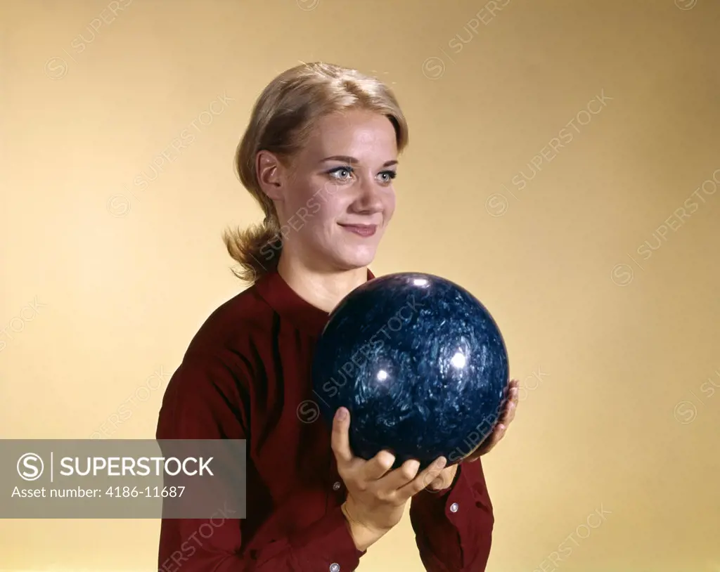 1960S Young Blond Woman Holding Bowling Ball Wearing Red Shirt