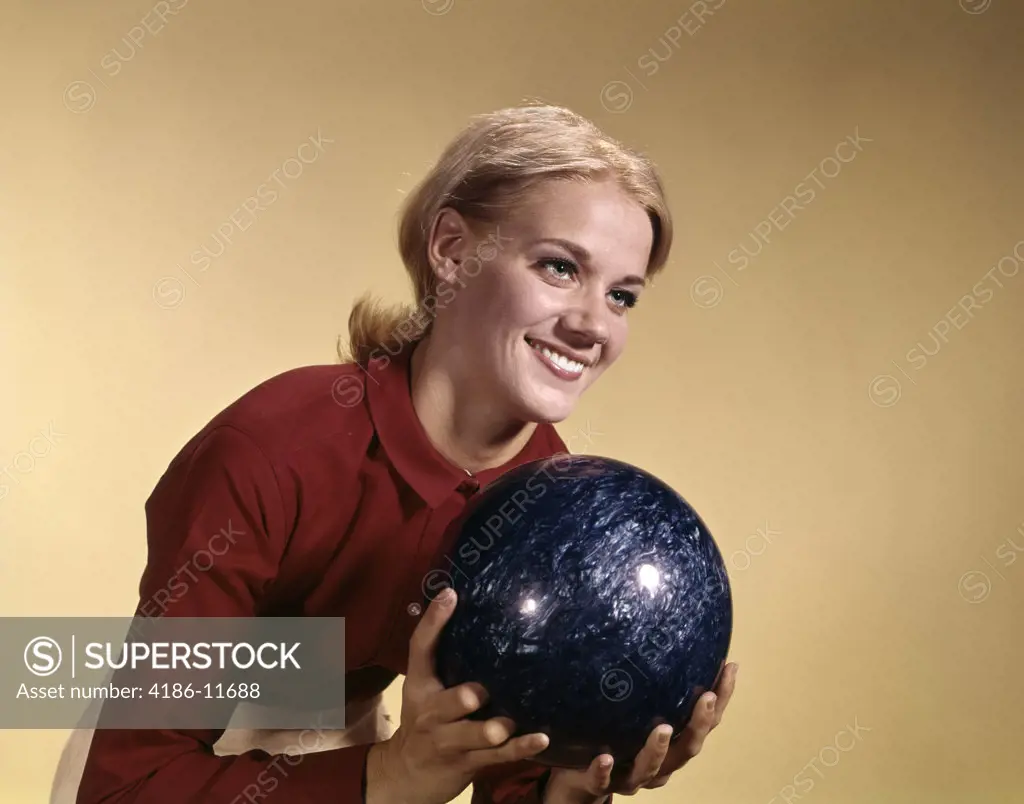 1960S Young Blond Woman Holding Bowling Ball Wearing Red Shirt