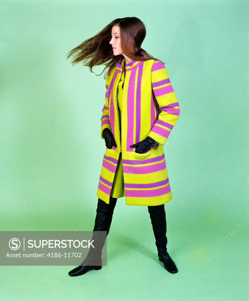 1960S Young Woman Wind Blown Hair Wear Green Purple Stripe Cloth Coat Thigh High Boots