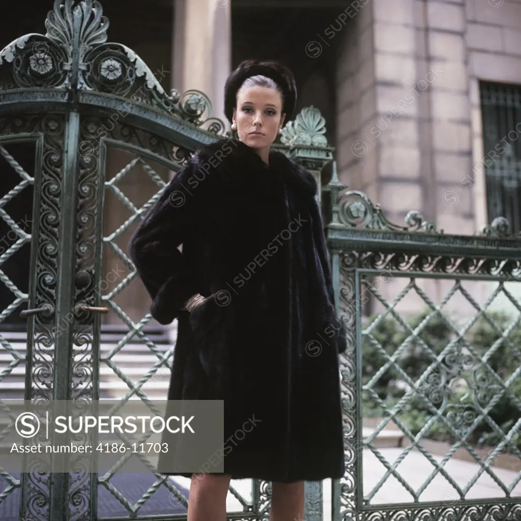 1960S Young Woman Wearing Dark Mink Coat Hat Standing Ornate Wrought Iron Gate Fur