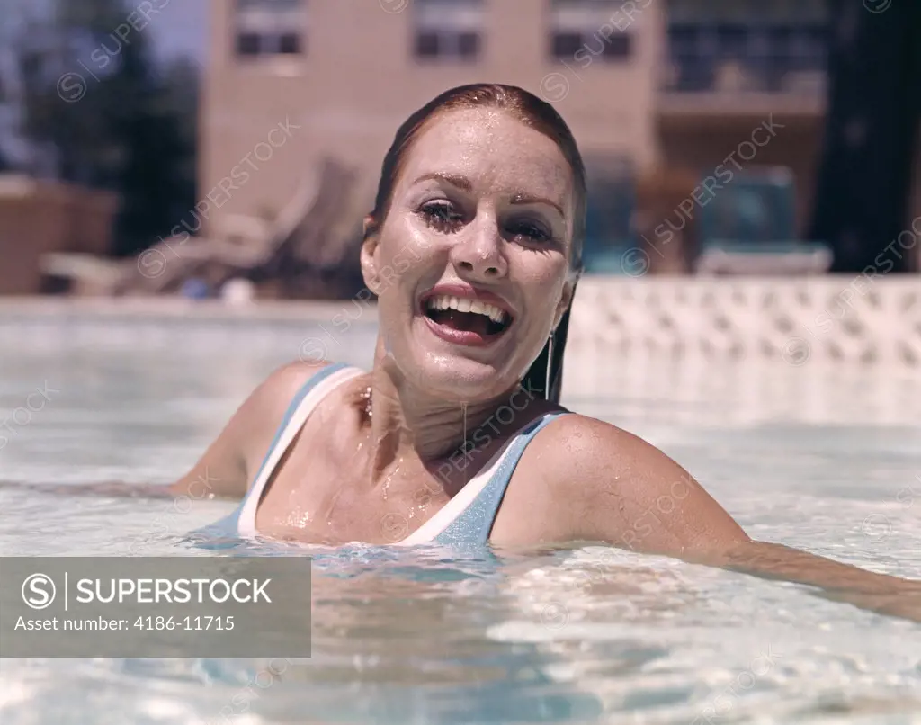 1960S Woman Laughing In Swimming Pool