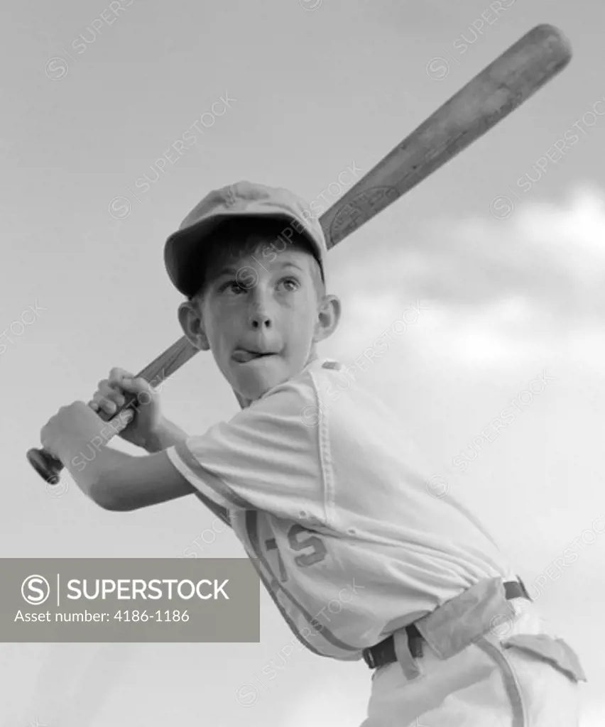 1970S Boy Playing Baseball Holding Bat Ready To Hit The Ball