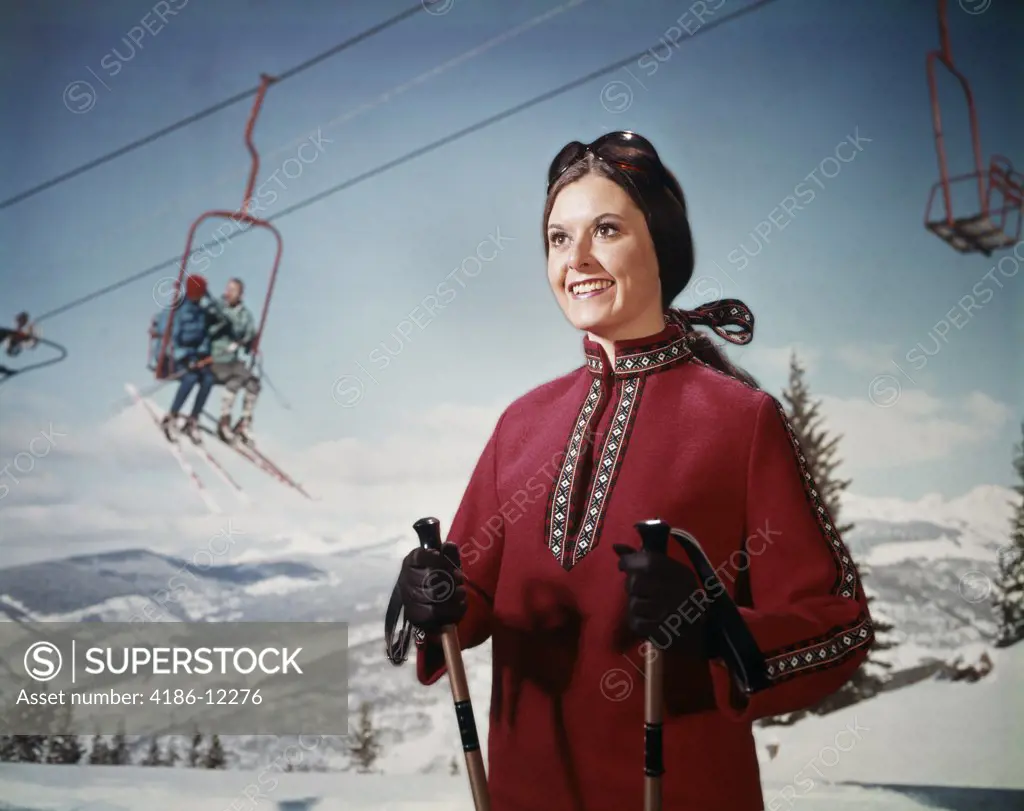 1950S 1960S Smiling Young Woman Red Poncho Ski Lift Background