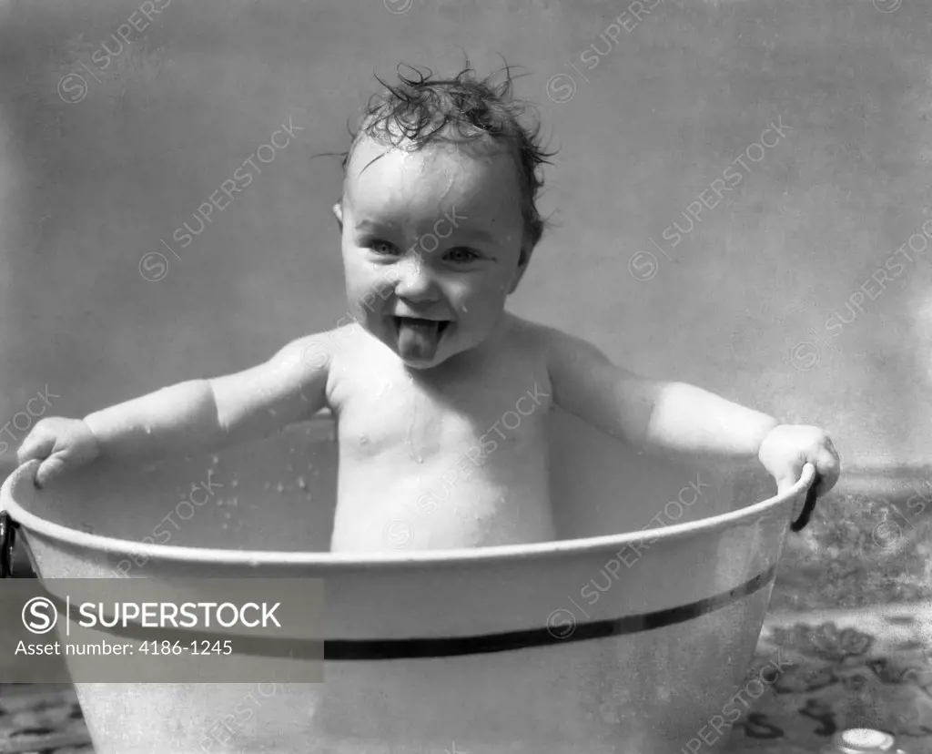 1930S Wet Baby In Washtub Sticking Out Tongue