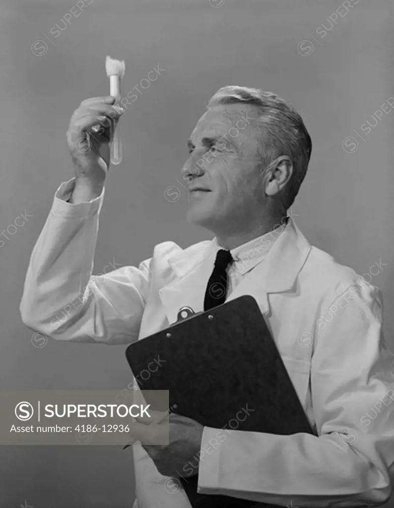 1960S Man Scientist Studying Test Tube