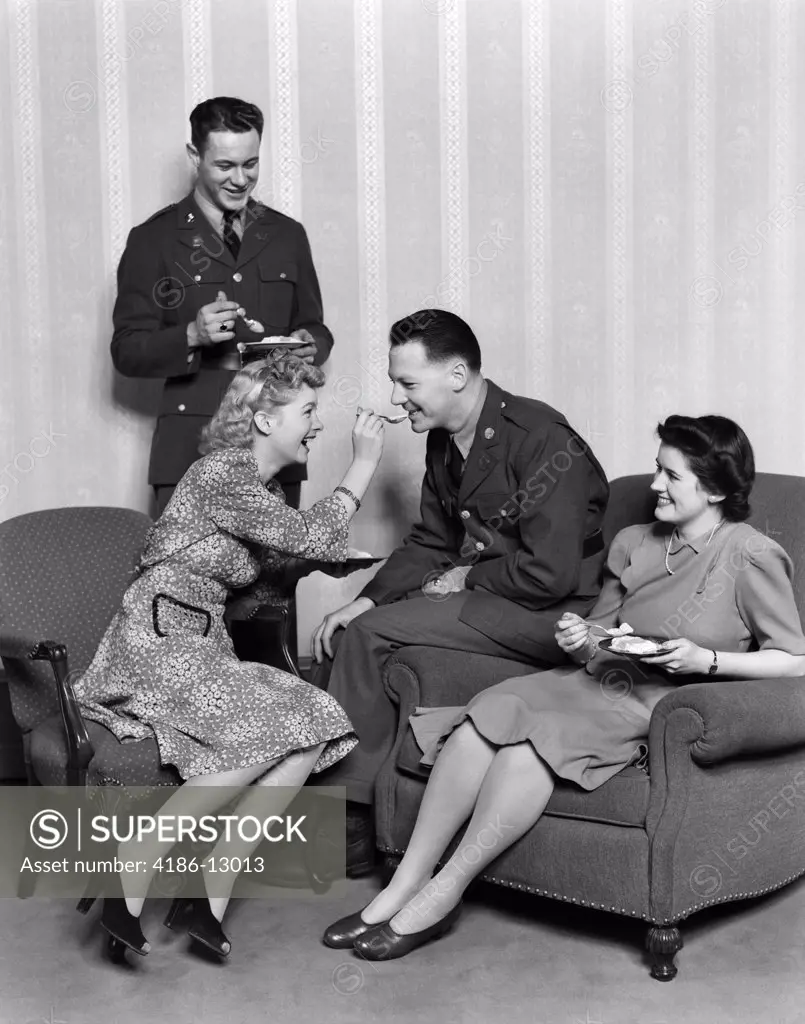 1940S Couples Eating Dessert Men In Uniform Woman Spoon Feeding Man