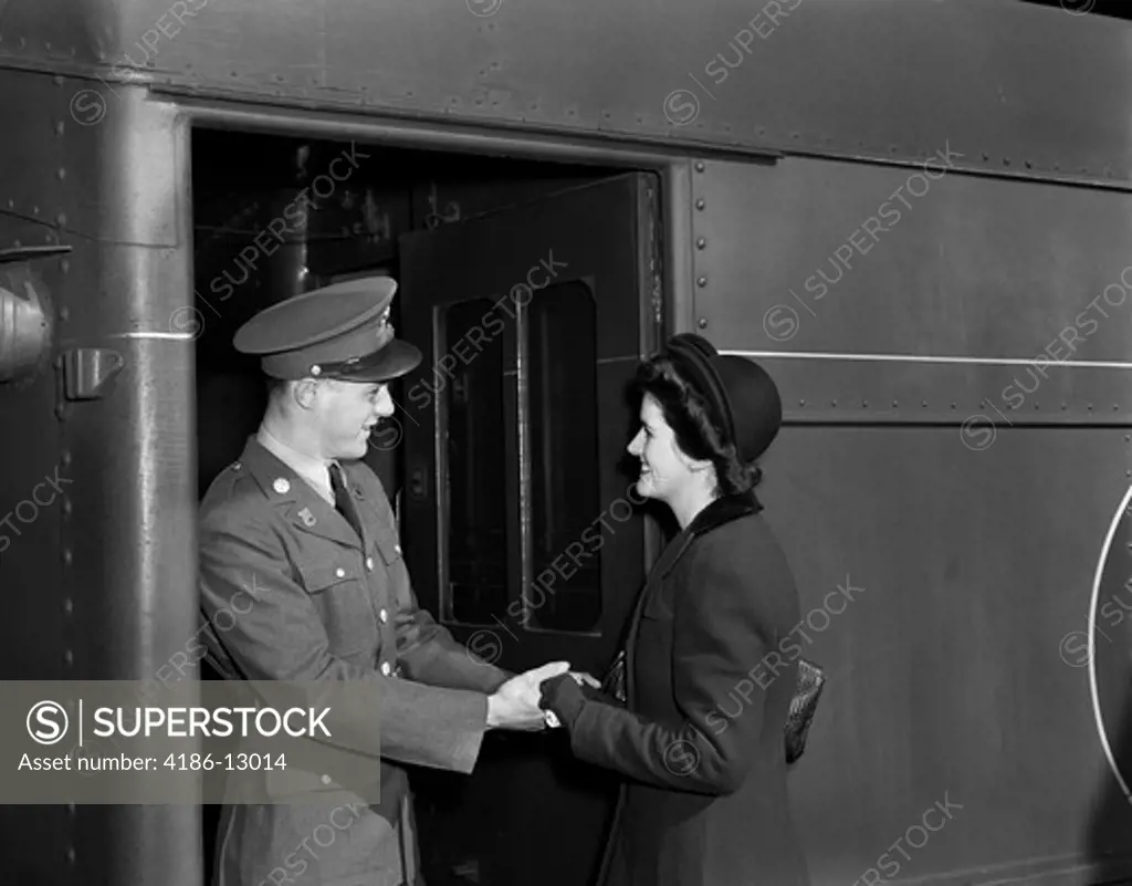 1940S Soldier Saying Goodbye To Woman At Train Station