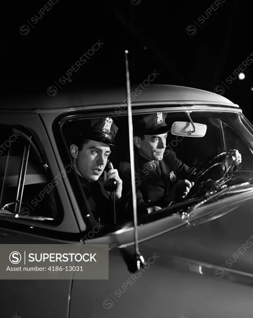 1950S Policemen Pair Driving At Night