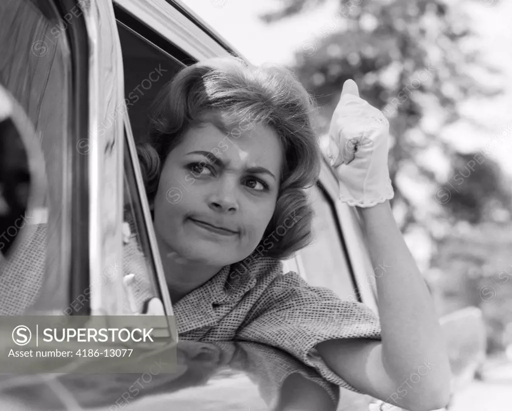 1950S Portrait Of Angry Woman Driver Gesturing With Gloved Hand
