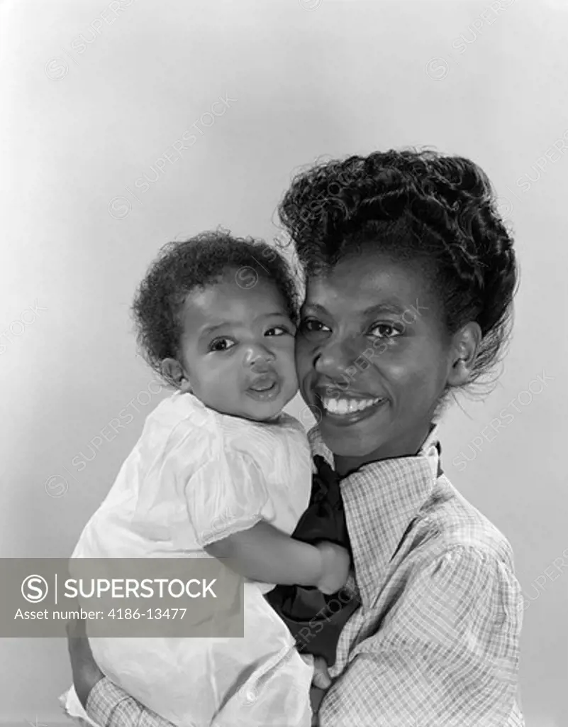 1950S African American Mother Holding Baby