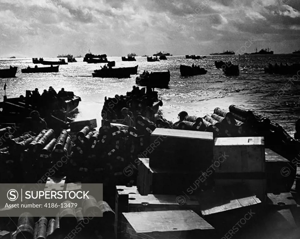 1940S World War Ii Dawn Dusk Coast Guard Landing Craft Crowding Shallow Invasion Waters Soldiers