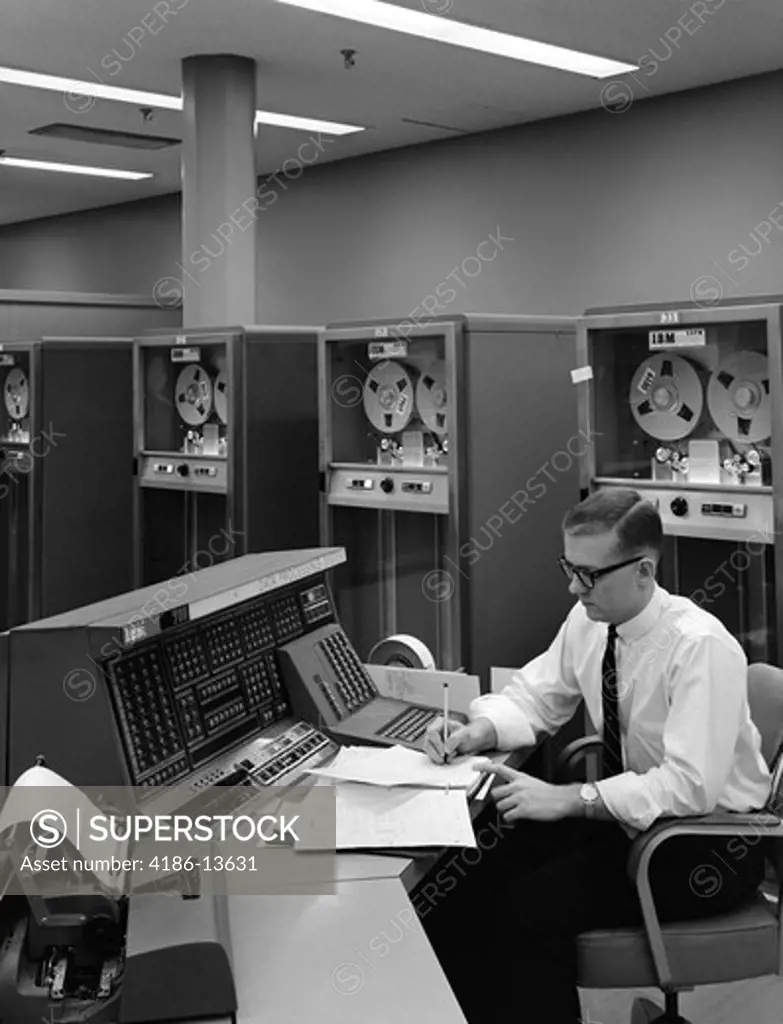 1960S Man In Shirt & Tie & Glasses At Control Console For Ibm Data Processing System