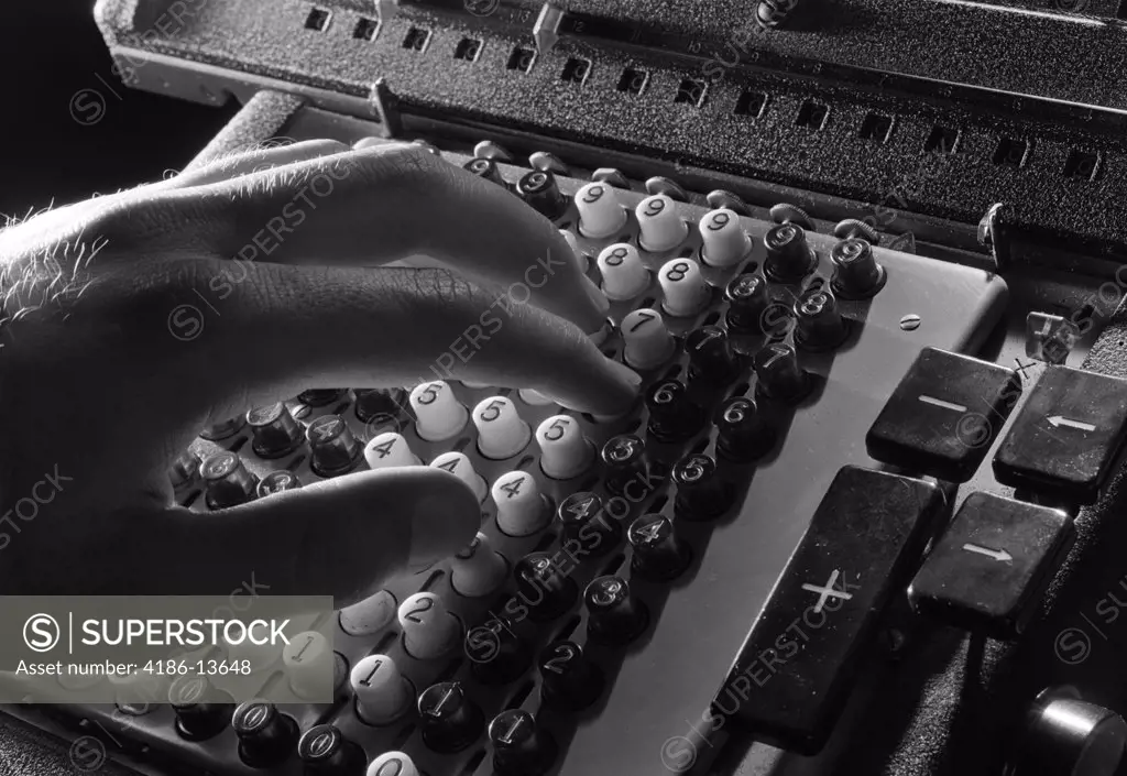 1950S Mans Hand About To Press Buttons On Mechanical Adding Machine Calculator