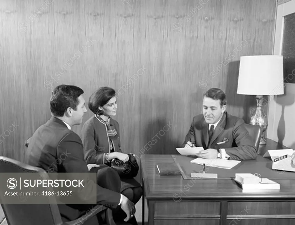 1960S Couple Meeting Interviewing With Businessman Attorney Banker