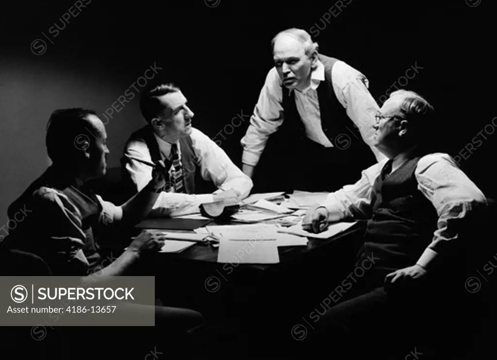 1940S Back Room Conference With Men Businessmen And Politicians Around Table In Shirtsleeves And Vests Making Deals Indoor Studio