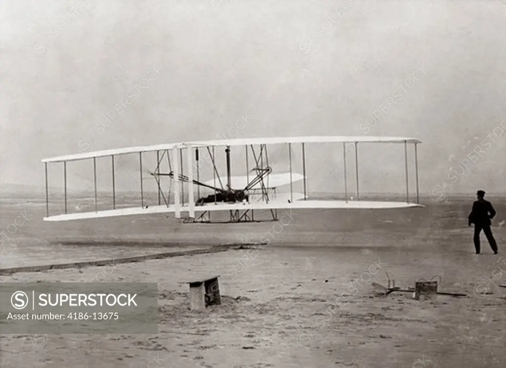 1903 Wright Brothers' Plane Taking Off At Kitty Hawk