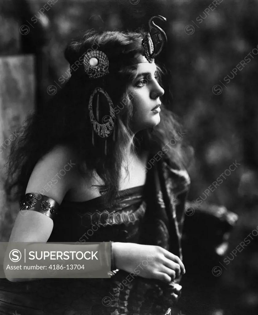 1910S 1920S Woman In Egyptian Looking Costume Wearing Jeweled Arm Cuff & Ornate Head Piece With Snake On Front