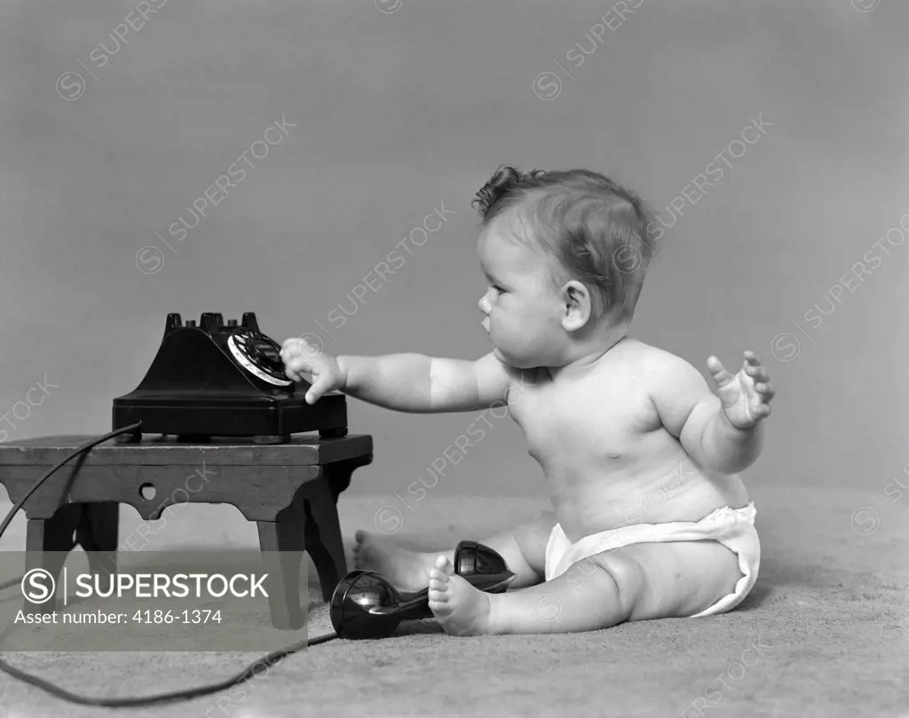 1940S Baby In Diaper Dialing Telephone