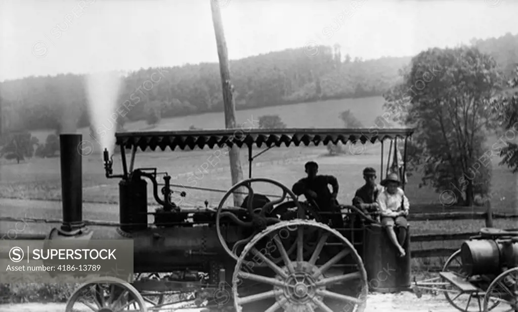 1890S 1900S Turn Of The Century Group Of Three Men Riding On Large Steam Tractor