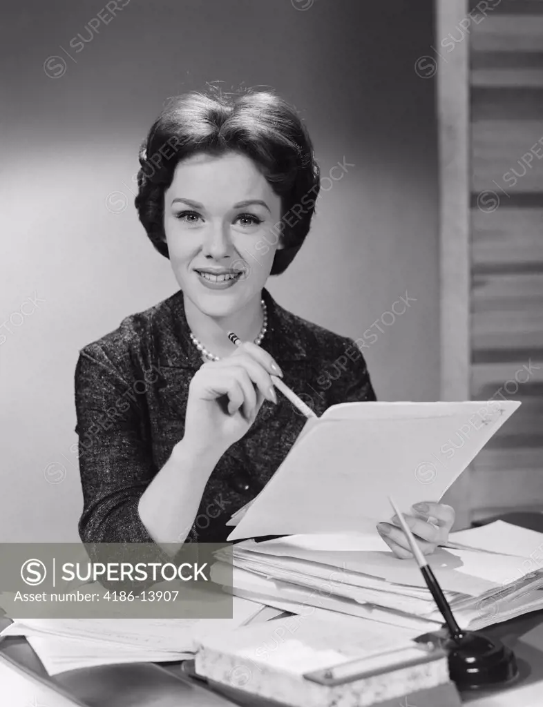 1950S 1960S Portrait Smiling Executive Woman Holding Files Papers