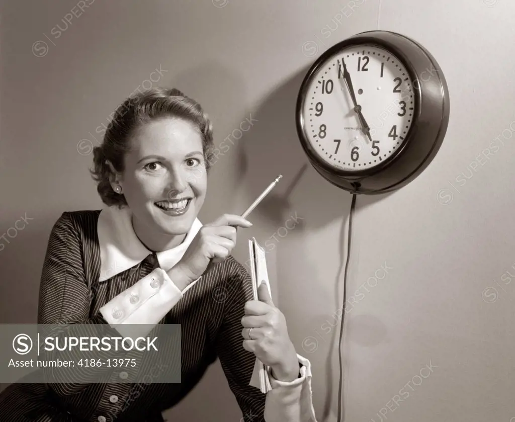 1950S Smiling Woman Stenographer Office Worker Holding Steno Pad Pointing With Pencil To Clock 5 Minutes Till Quitting Time