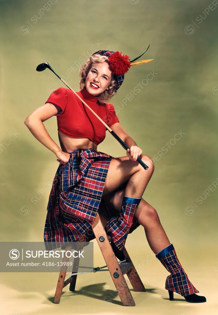 1940S 1950S Portrait Smiling Blond Woman Pinup Wearing Plaid Tam Red Cropped Sweater Plaid Skirt And Boots Holding Golf Club