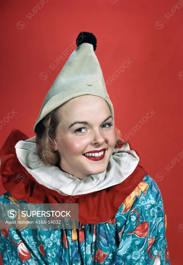 1940S 1950S Portrait Smiling Woman Wearing Clown Outfit Pointed Hat Pom Pom Ruffled Collar