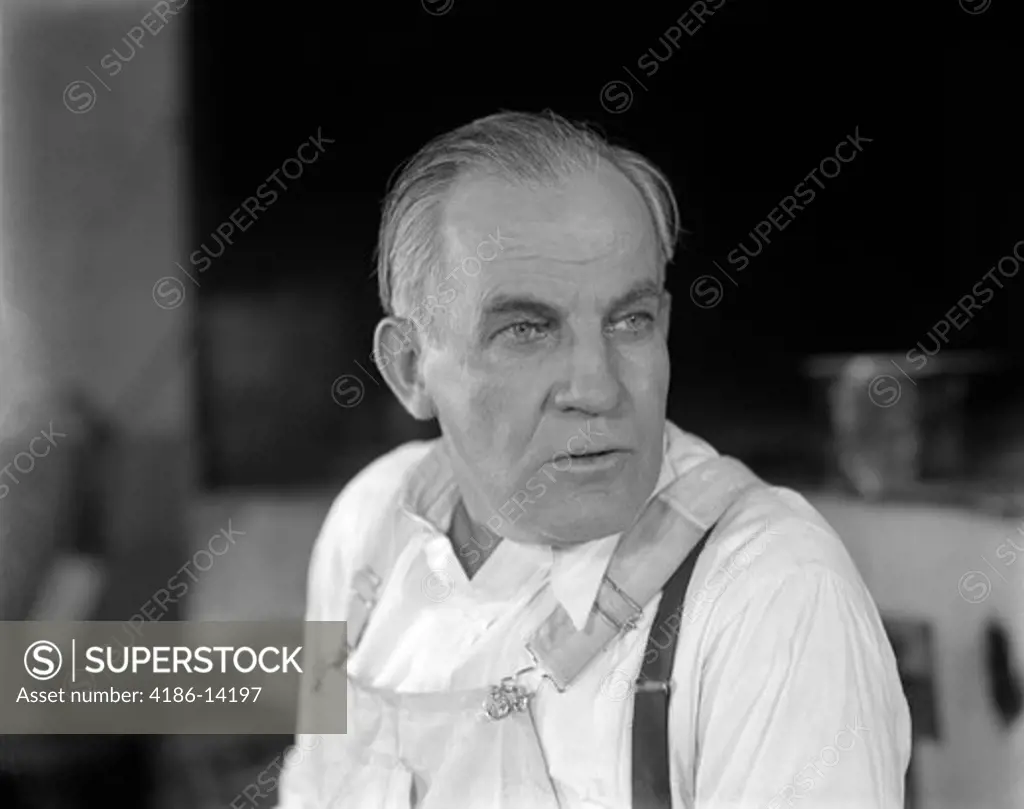 Older Man Overalls Portrait