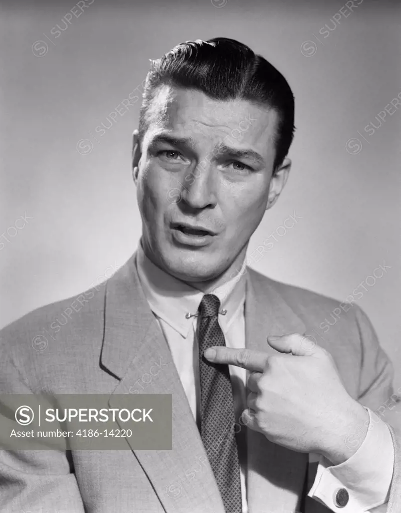 1950S Man Businessman Serious Expression Pointing To His Chest Confused Questioning Who Me