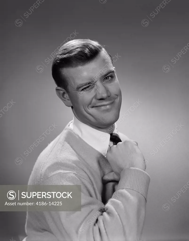 1950S Smiling Young Man Winking Right Eye And Pointing Proudly To Himself