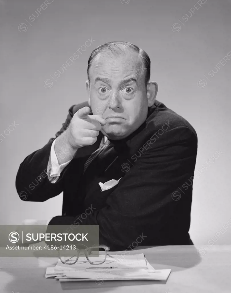 1950S 1960S Angry Businessman Pointing Finger Bulging Staring Eyes Wide Open  