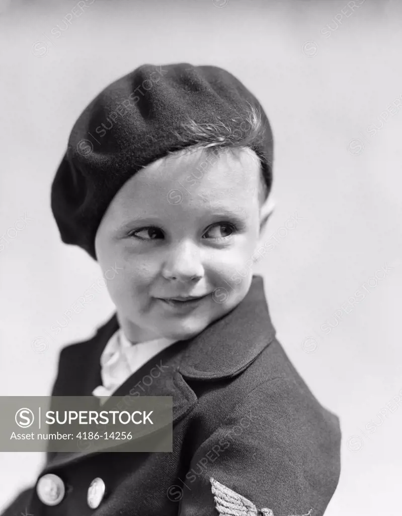 1930S Studio Portrait Of Young Boy Look To The Side Wearing A Beret And A Double Breasted Jacket