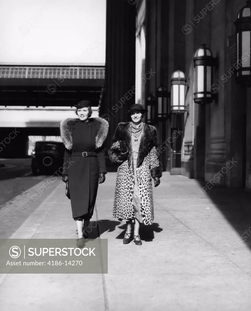 1930S Two Women Walking By 30Th Street Train Station One Wearing Coat With Fur Stole The Other Wearing Leopard Fur Coat Outdoor