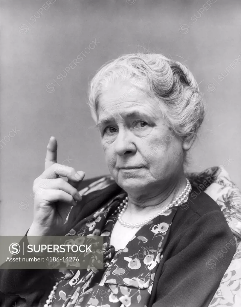 1930S Portrait Of Elderly Woman With Finger Raised At Viewer