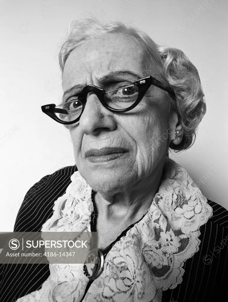 1960S 1970S Portrait Senior Woman Facial Expressions Critical Disapproving Mean Aged Grumpy Geriatric Old Maid Granny