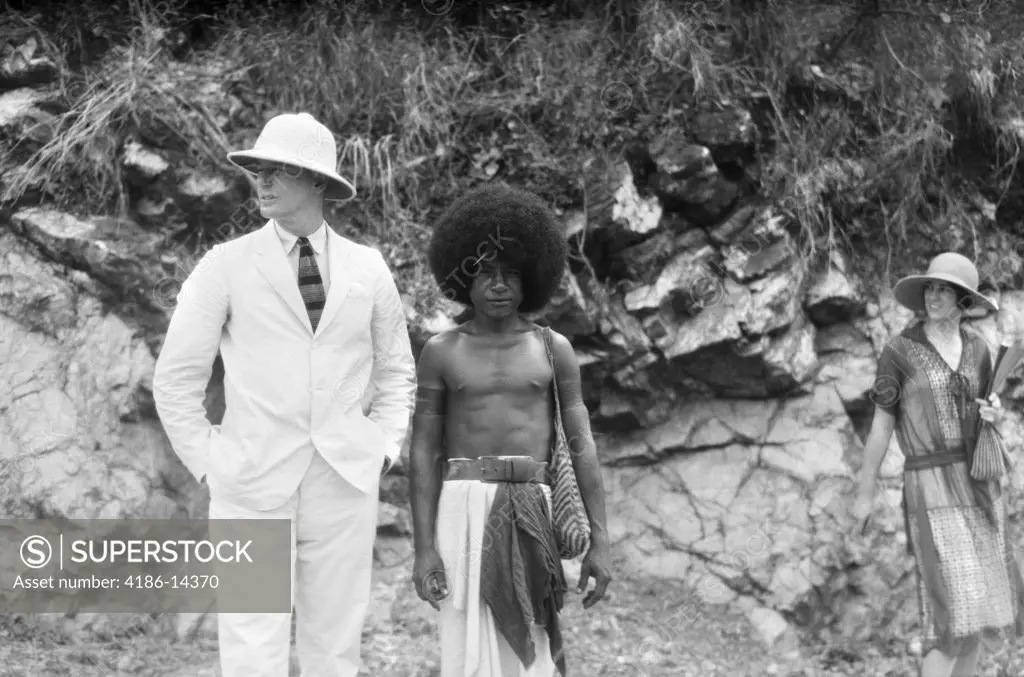 1920S 1930S Man In White Suit Pith Helmet With Native Guide Port Moresby New Guinea