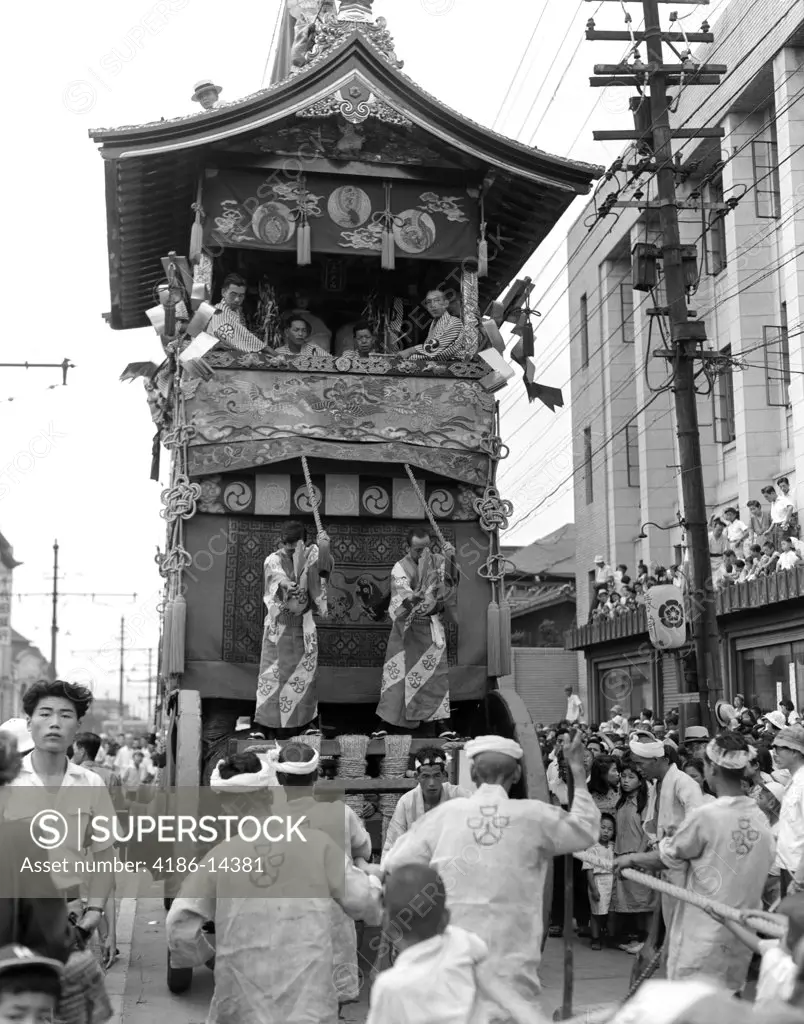 1950S Men Pulling Large Float In Parade Gion Matsuri Festival Kyoto Japan