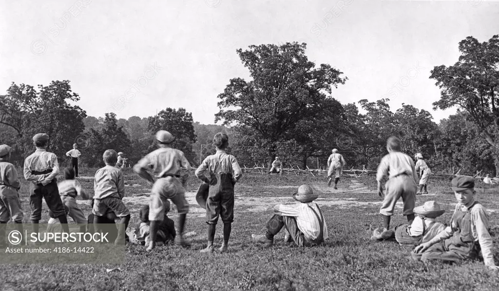 1900S 1910S 1920S Group Of Boys Playing Baseball On Outdoor Field Jackson County Missouri Usa