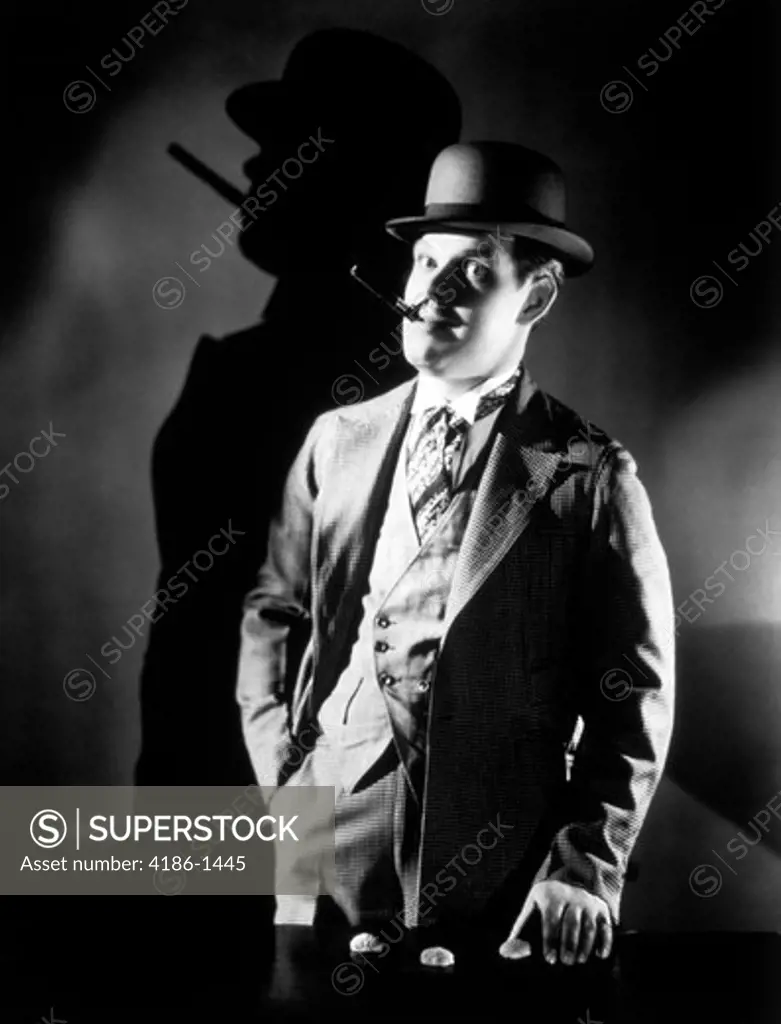 1920S 1930S Con Man Wearing Bowler Hat Operating Shell Game Smoking Cigar 