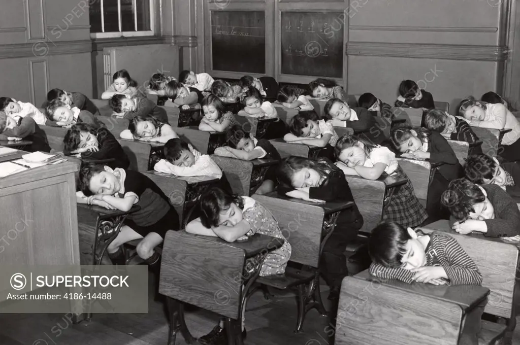 1930S Elementary Grade School Students Children Sleeping With Heads Resting On Their Desks