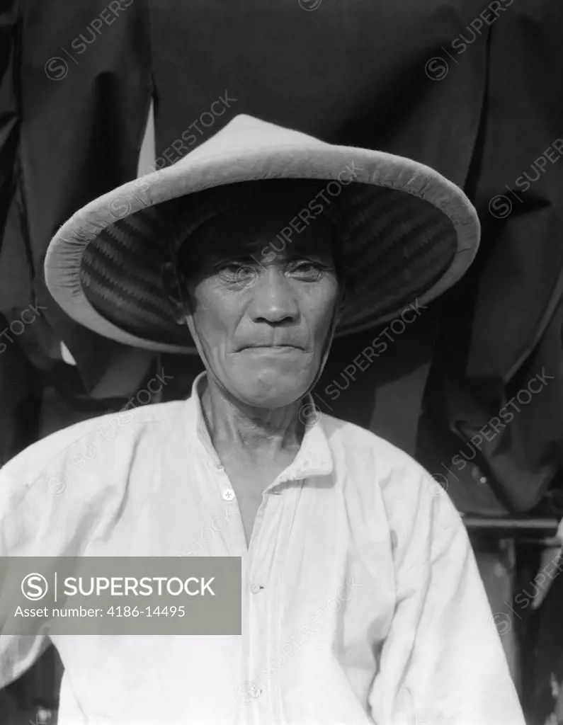 1930S Old Rickshaw Coolie Portrait Unsmiling Wearing Straw Hat Worker Mean Unhappy Expression Yokohama Japan
