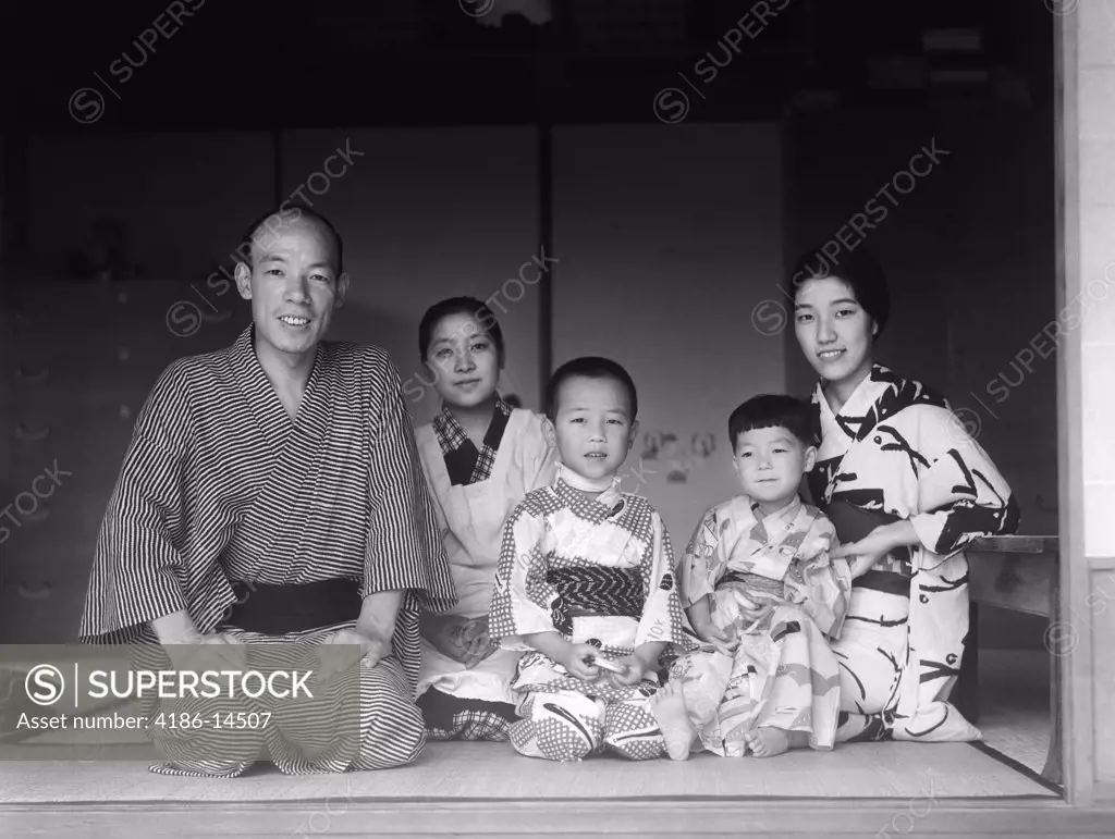 1930S Typical Japanese Family Of 4 With Maid Servant At Home Portrait Kimonos Traditional Native Costume Japan