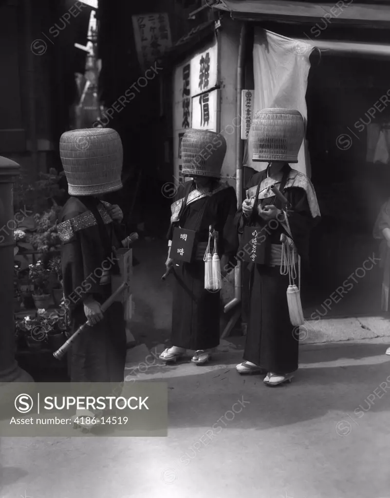 1930S Japanese Mendicant Holy Men In Front Of Religious Temple Wearing Baskets Over Heads Hidden Secret Society Japan