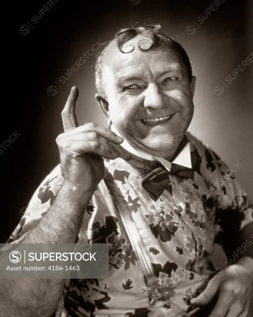 1930S Smiling Character Man With Two Spit Curls On Forehead Pointing Index Finger