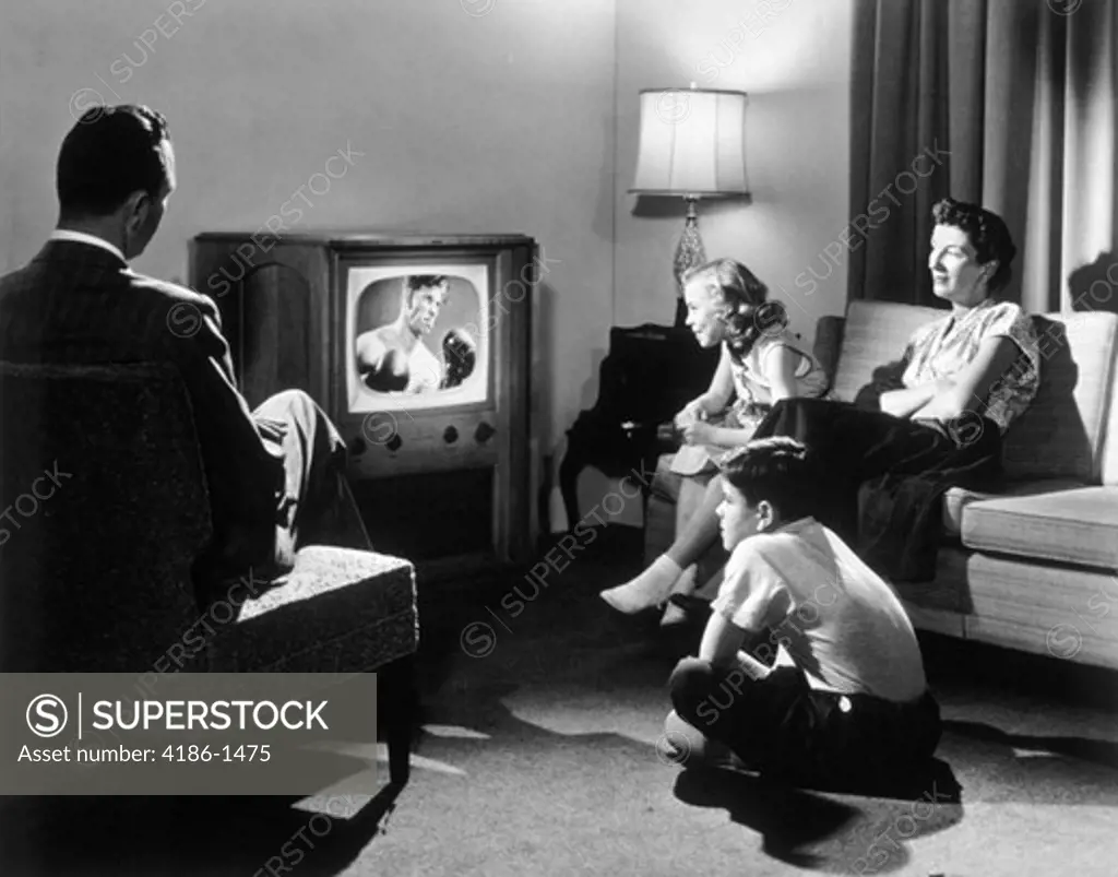 1950S Family In Living Room Watching Television