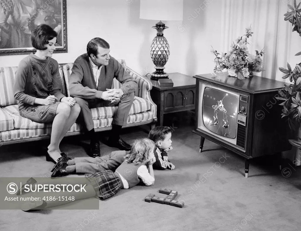 1960S Family Of 4 Watching Television