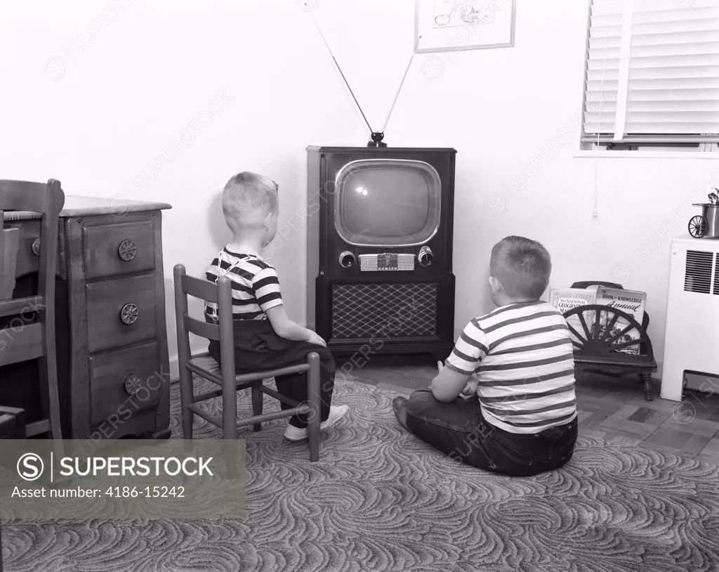 1950S Back View Of 2 Boys In Striped T-Shirts Watching Tv