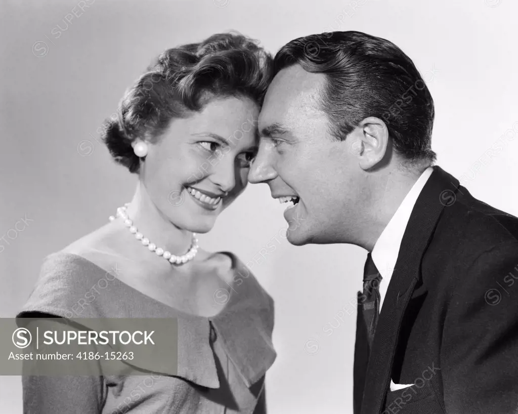 1950S 1960S Couple Man Woman Smiling Posed Head To Head 
