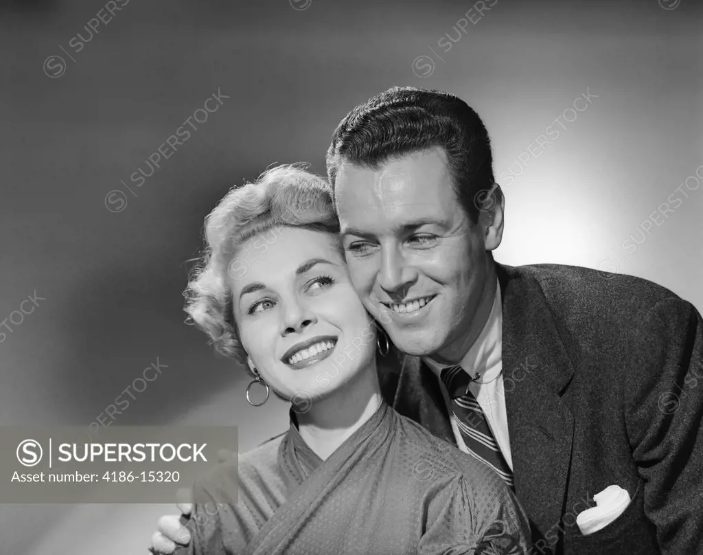 1950S Couple Portrait Smiling Cheek To Cheek Studio Shot