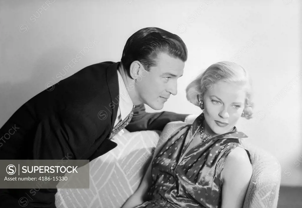 1950S Couple With The Woman Sitting Looking Away Man Profile Looking Blond Hair Well Dressed Satin